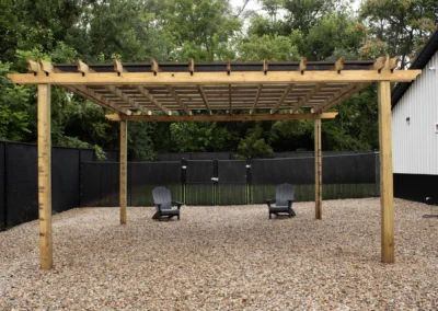 Outdoor play area with pergola providing shade